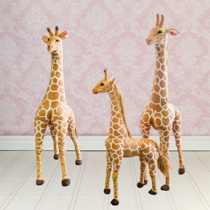 Giant Standing Giraffe Plush – Safari-Inspired Statement Decor in three sizes: 120 cm (47.2 in), 100 cm (39.4 in), and 80 cm (31.5 in), displayed against pink patterned wallpaper