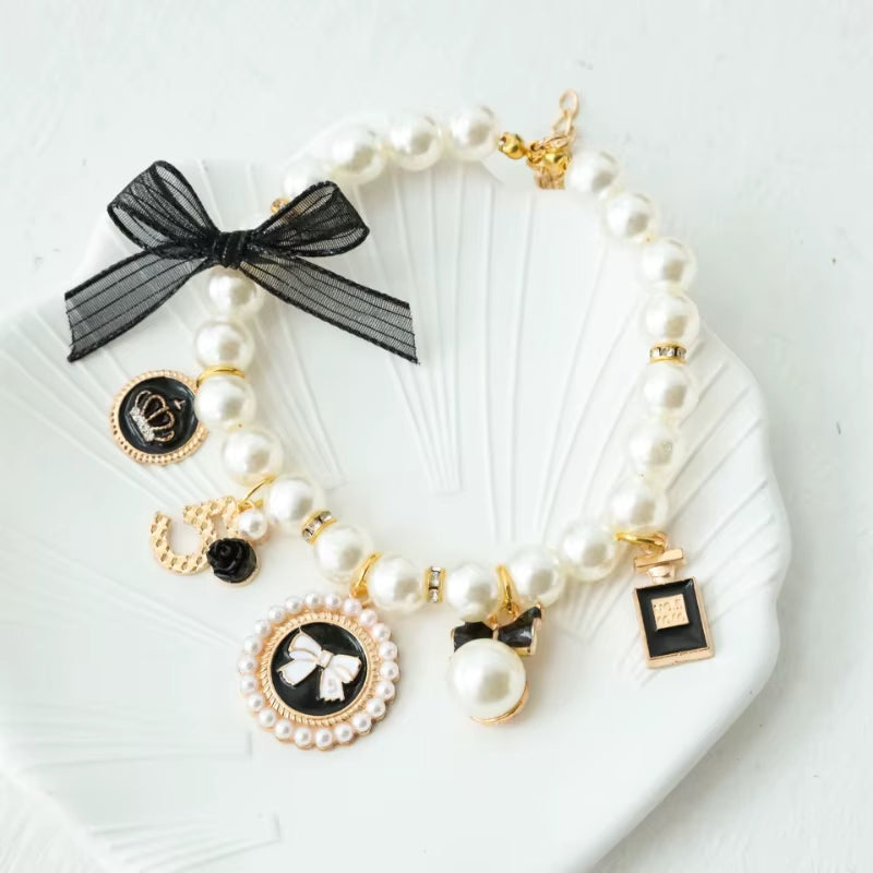 Sparkle in Style: Jeweled Pet Pearl Bow Dog Collar - Perfect for Your Little Princess!