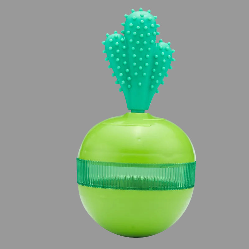 Green interactive dog treat dispenser ball with textured dental cleaning top.