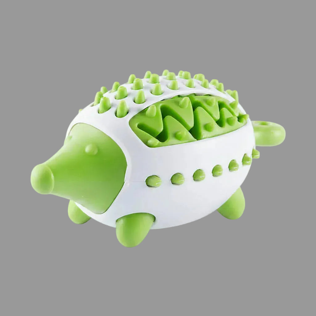 Green interactive dog treat puzzle toy with textured chewing surface.