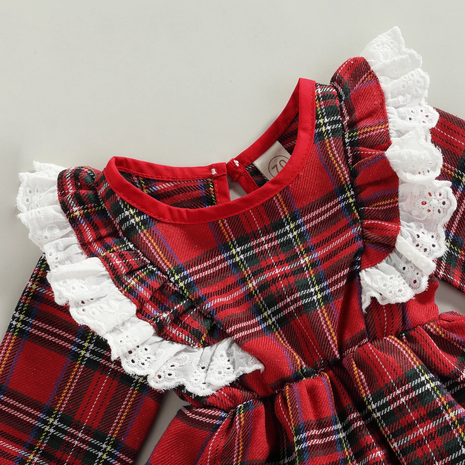 Close-up luxury baby romper – plaid fabric with lace ruffle neckline