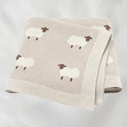 Oatmeal sheep knit baby blanket folded for product display