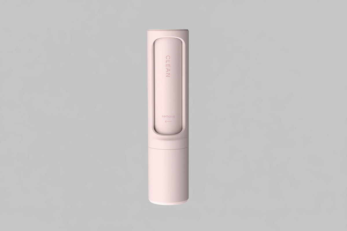 Blush Pink reusable pet hair remover roller.