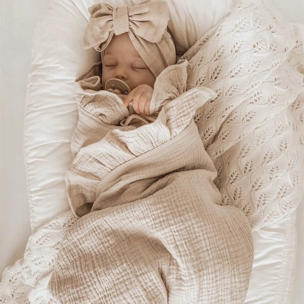Organic muslin swaddle blanket in Sandstone – soft ruffled baby wrap for newborns