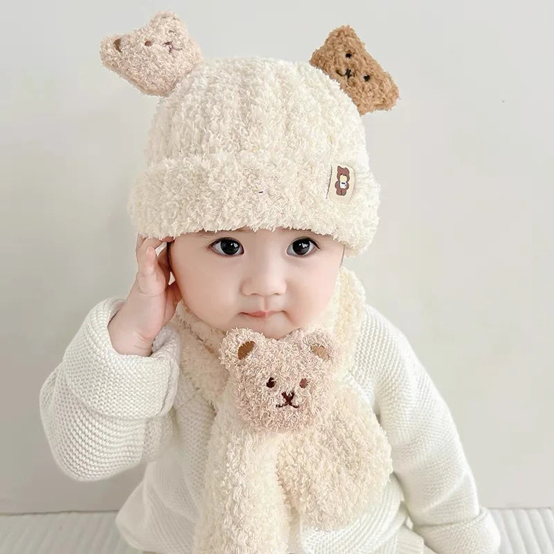 Infant wearing beige fleece bear ear hat and scarf set for winter