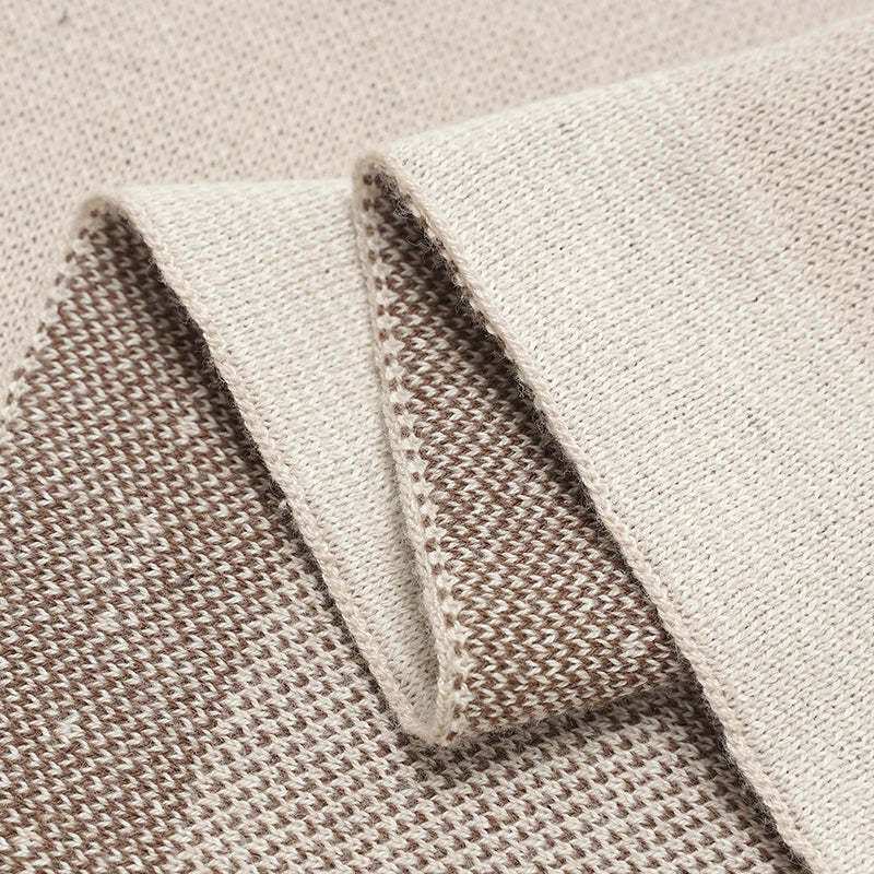Close-up of neatly finished knit baby blanket edges