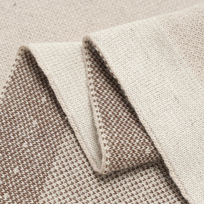 Close-up of neatly finished knit baby blanket edges