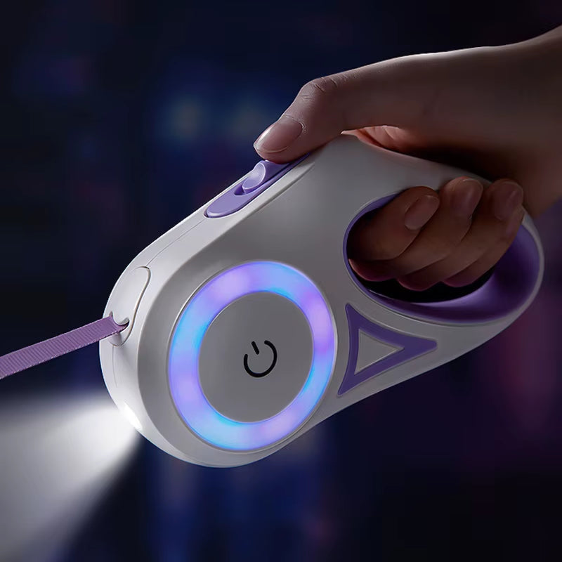 “Close-up of hand holding LED retractable dog leash with glowing blue light and built-in flashlight.”